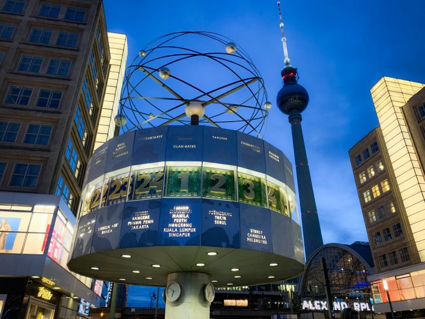 Berlin: Live-Guided Evening Sightseeing Tour by Open-top Bus - Friedrichstadt-Palast and Tränenpalast: getting the story beyond the headline