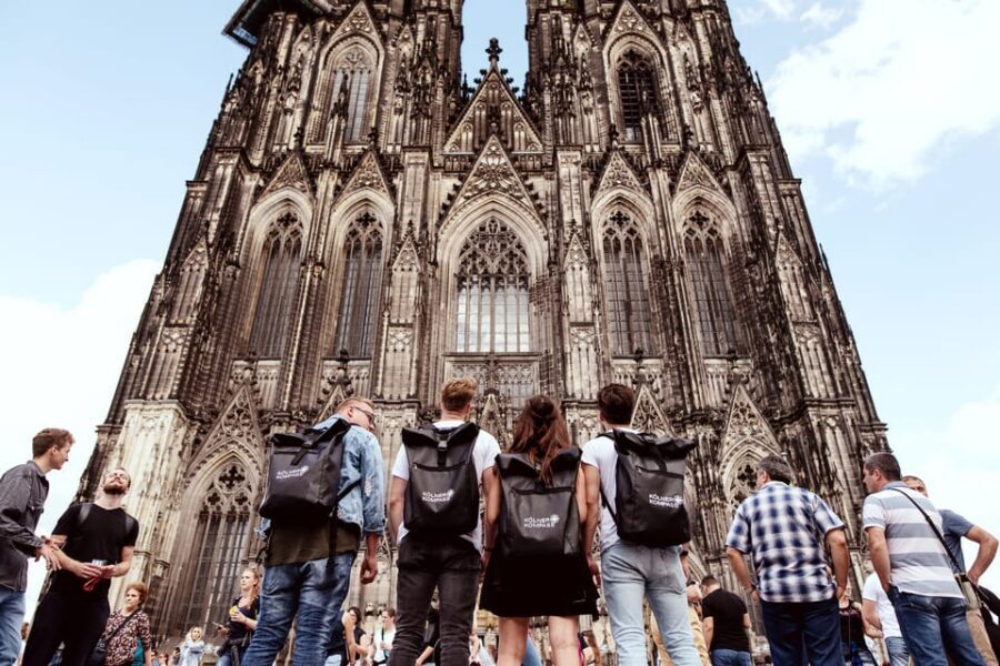 Cologne: Brewery Tour with 3 Kölsch Beer Tastings - The old town walk: Legends, jokes, and city texture