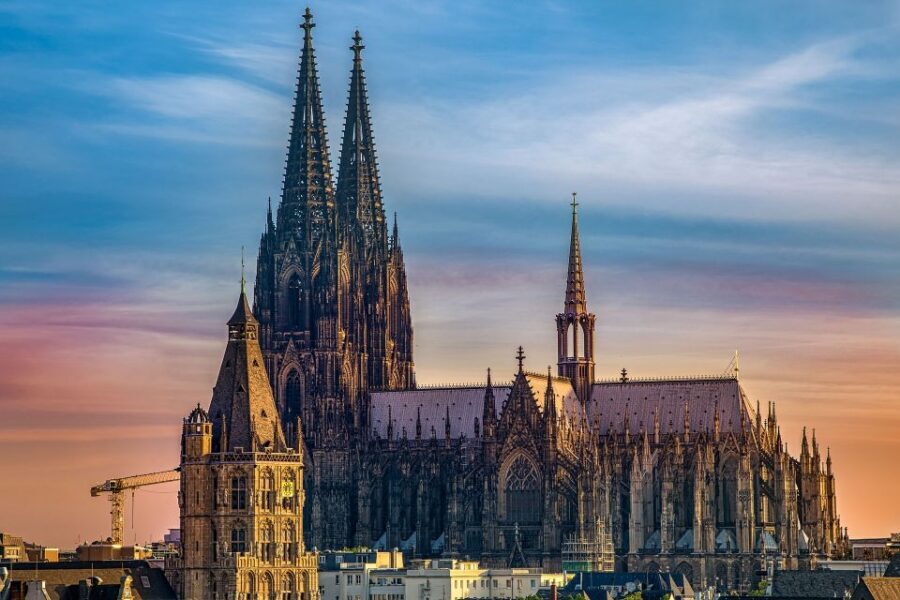 Cologne: Old Town Highlights Walking Tour - Hohenzollern Bridge and Rhine Views You Can Feel