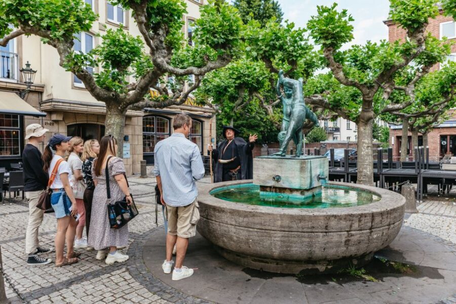 Düsseldorf: Guided Tour with a Night Watchman - Guide style in German: what to do if you’re not fluent