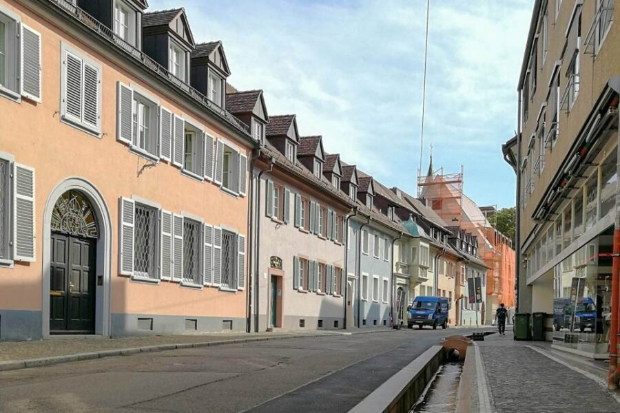 Freiburg: Gässle, Bächle and More City Tour - Rathausplatz: two townhalls, one big civic statement