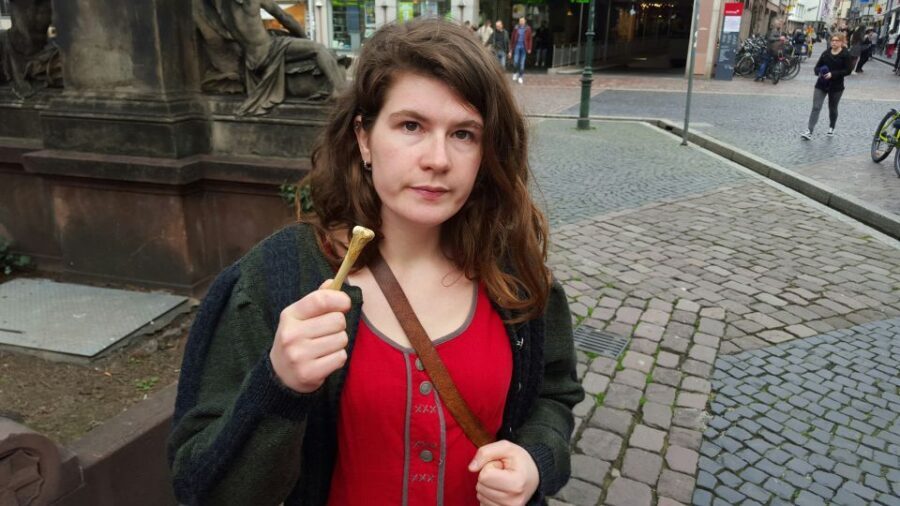 Freiburg: Guided City Tours with Actors - Old town waterlines and the Gerichtslaube (Old Court House) stop