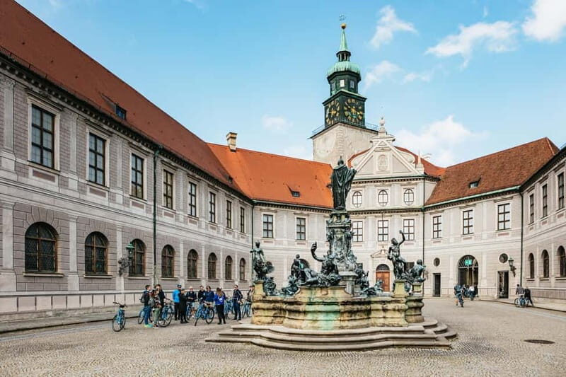 Munich: Guided City Tour by Bike with Beer Garden Stop - Starting at Marienplatz: Toy Museum clock tower meet-up